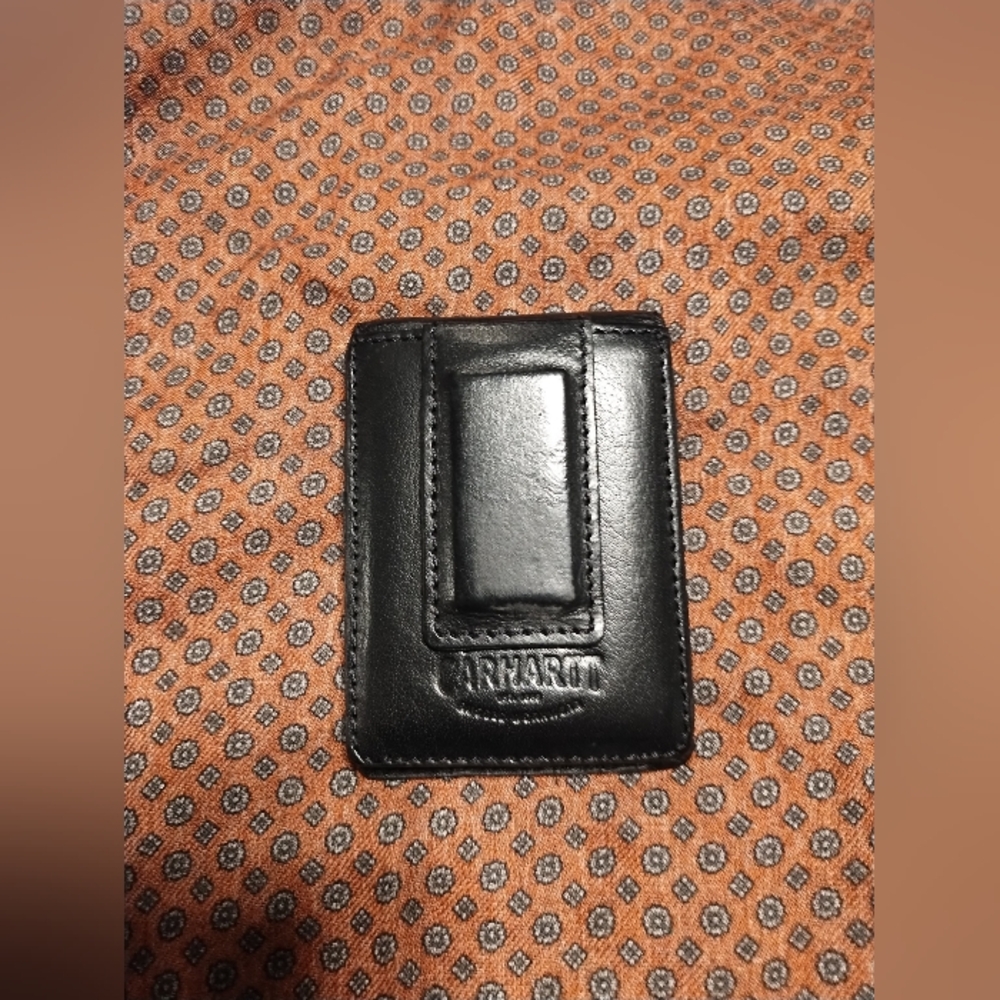 Carhartt leather wallet and money clip holds 6 cards comfortably. Like new